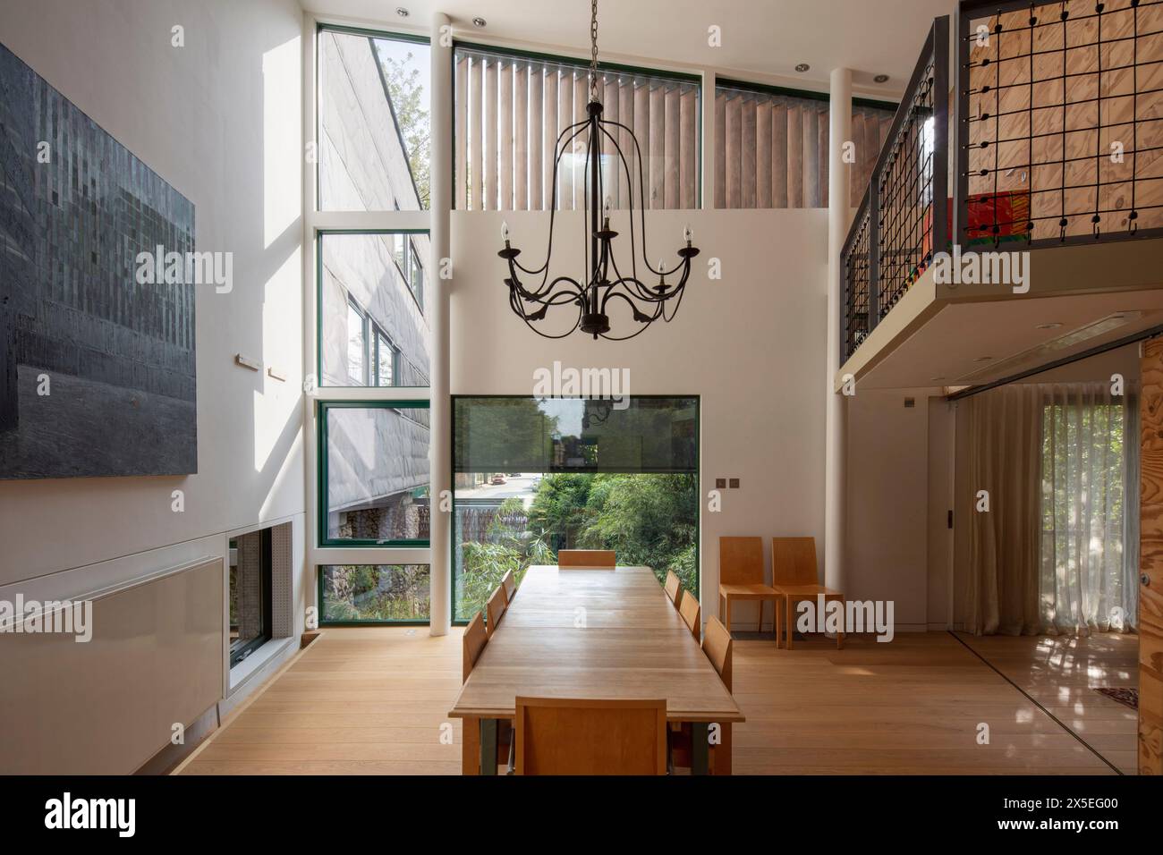 View down the main dining room space, sowing the double height ceiling