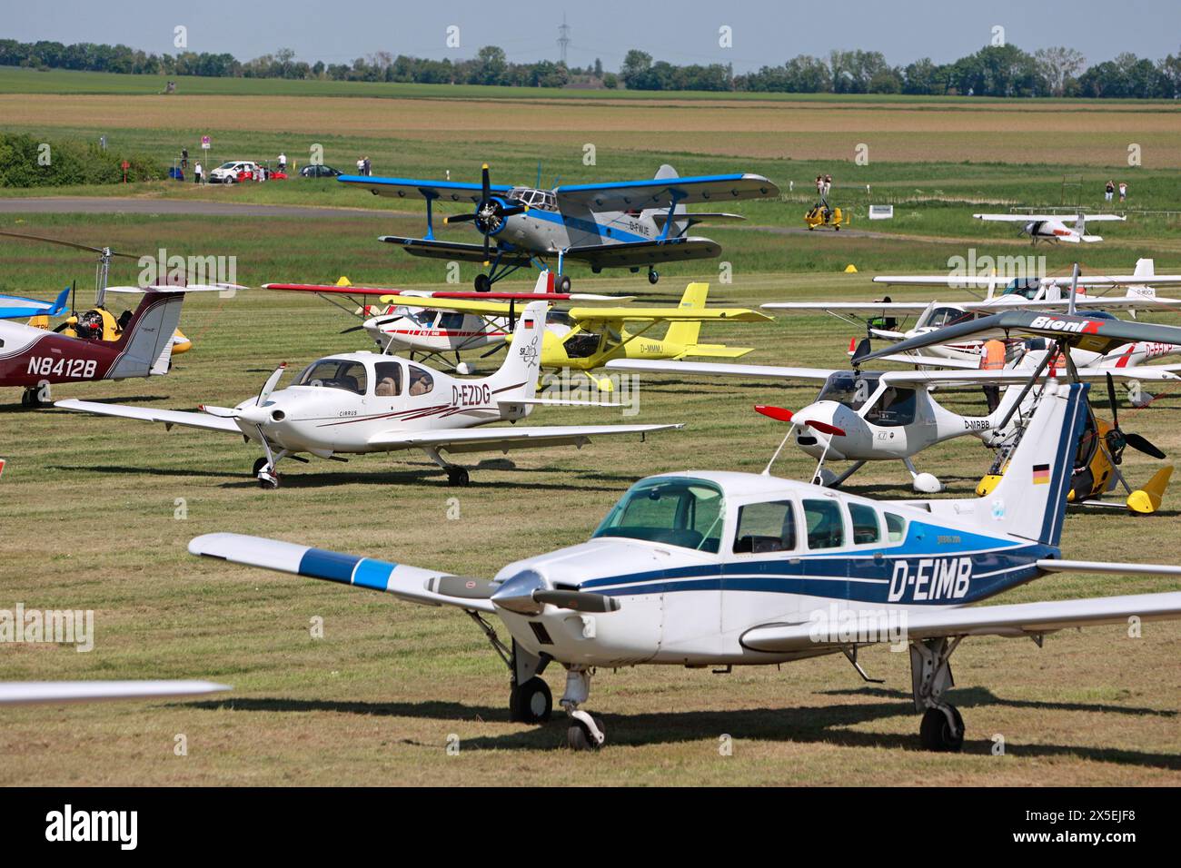 Ballenstedt, Germany. 09th May, 2024. Aircraft parked at the airfield in Ballenstedt. The commercial airfield in Ballenstedt hosted an open day on Ascension Day. Thousands of visitors experienced flight demonstrations and parachute jumps by participating pilots throughout the day. Credit: Matthias Bein/dpa/ZB/dpa/Alamy Live News Stock Photo