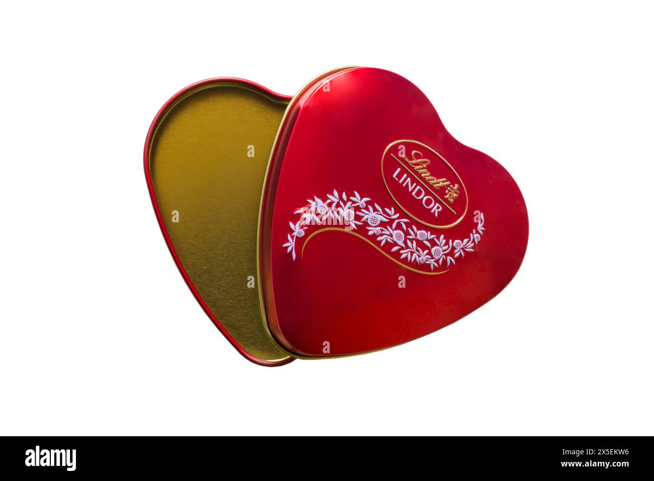 empty red Lindt Lindor chocolates heart shaped tin isolated on white background Stock Photo