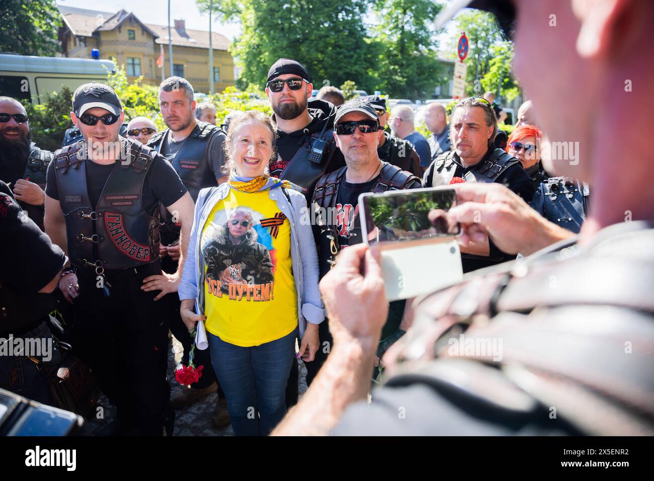 Berlin, Germany. 09th May, 2024. A woman wearing a T-shirt depicting ...