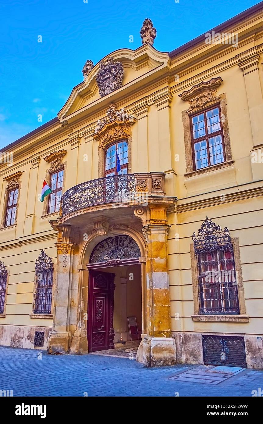 historic-building-with-stucco-decorations-and-the-gate-of-museum-of