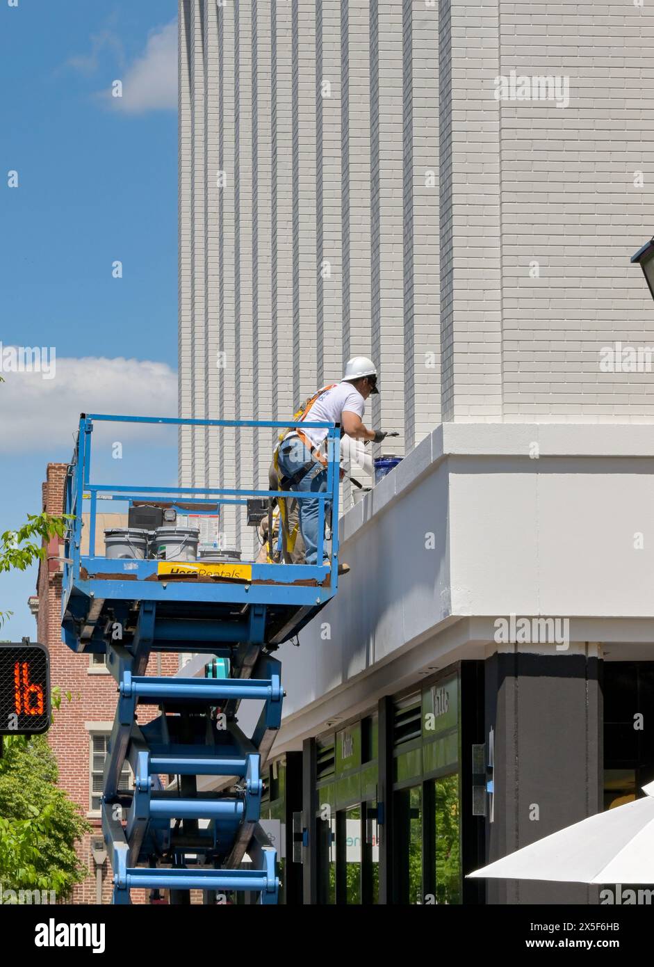 Alexandria, Virginia, USA 1 May 2024 People standing on a hydraulic