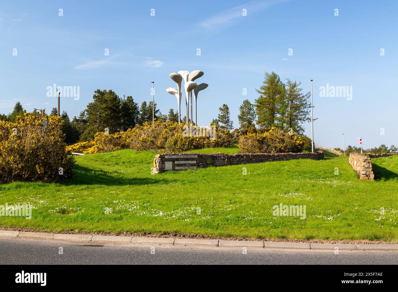 6 giant golf clubs on a roundabout near Gleneagles Hotel and Train Station Stock Photo
