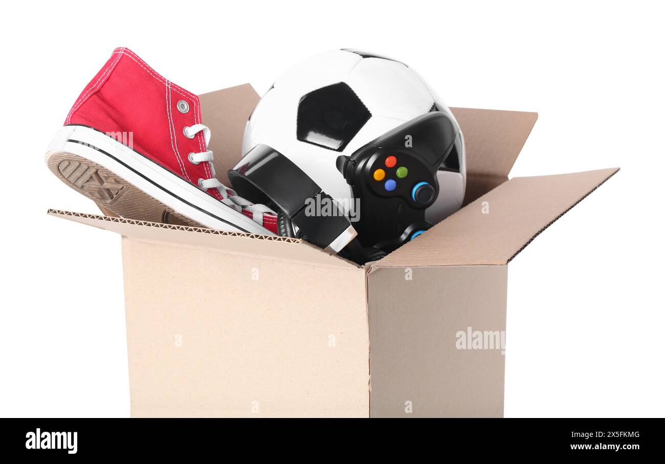 Over Stuff Box Box of unwanted stuff isolated on white Stock Photo - Alamy
