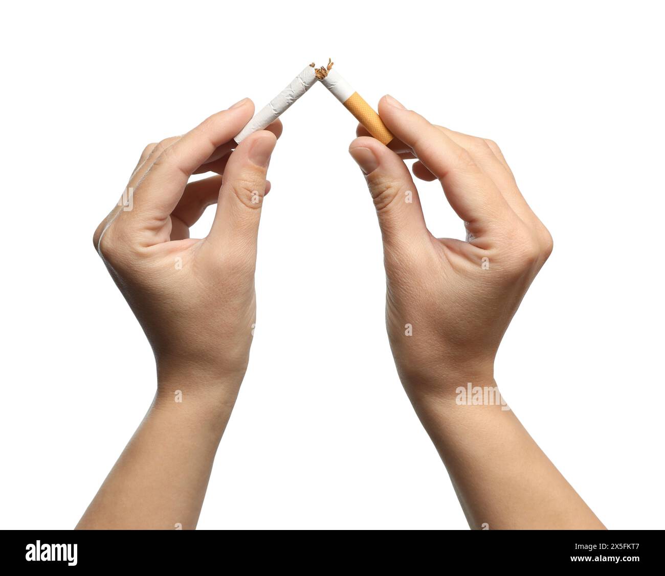 Stop smoking. Man holding broken cigarette on white background, closeup Stock Photo