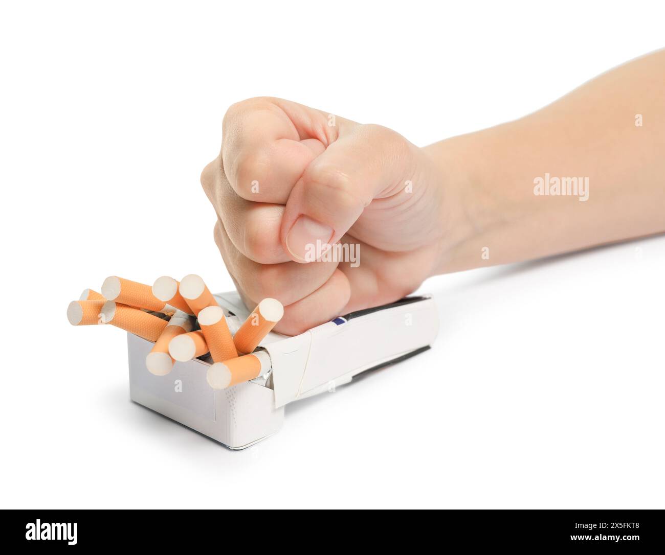 Stop smoking. Man crushing pack with cigarettes on white background, closeup Stock Photo