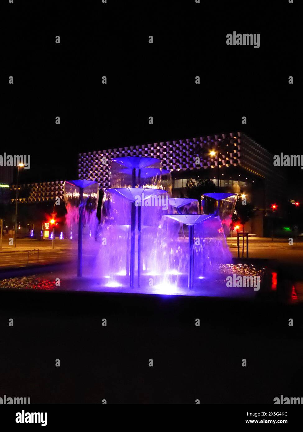 The Shell Fountain at Dippoldeswalder Platz in Dresden is a notable landmark, especially at night. Stock Photo