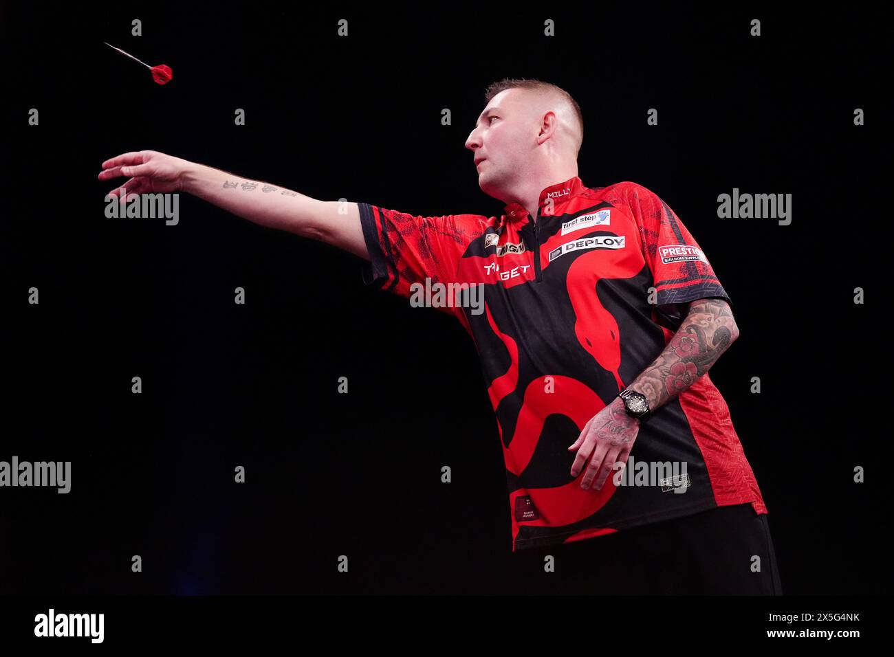 Nathan Aspinall in action against Michael Smith (not pictured) during night fifteen of the BetMGM Premier League held at the First Direct Arena, Leeds. Picture date: Thursday May 9, 2024. Stock Photo