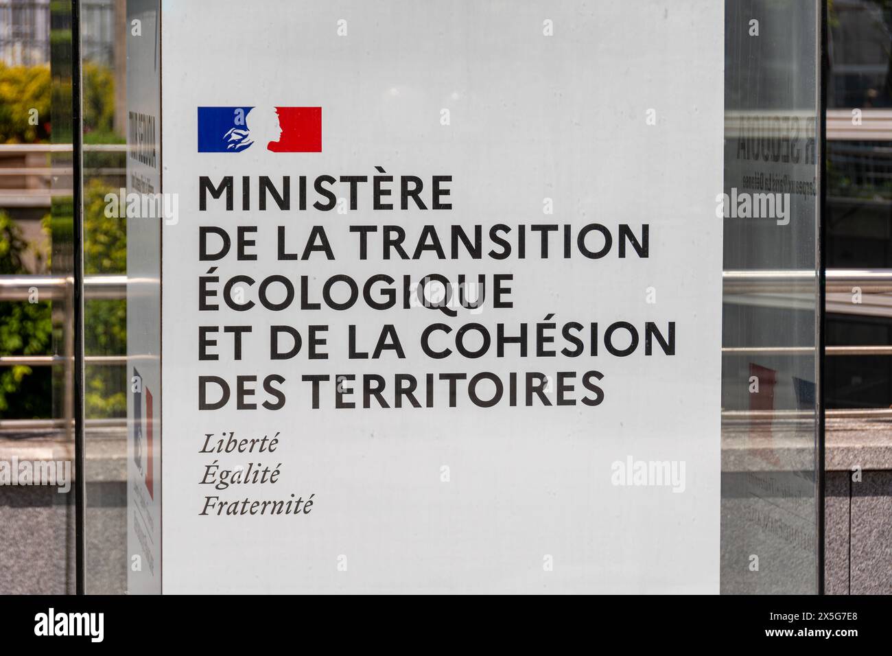Sign at the entrance to the building of the Ministry of Ecological Transition and Territorial Cohesion with the logo of the French Republic Stock Photo