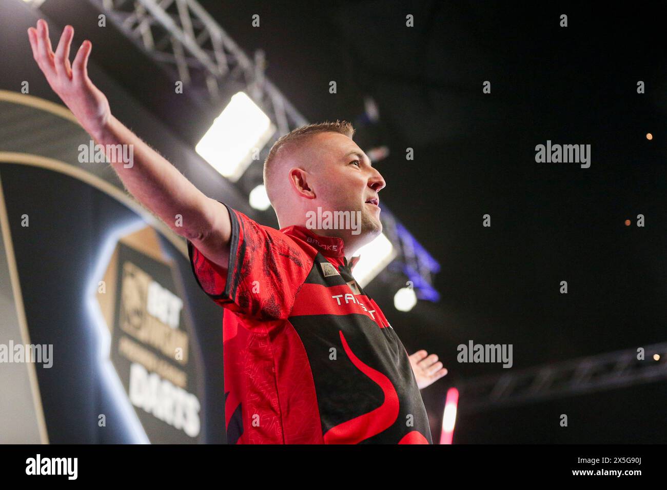 Leeds, UK. 09th May, 2024. Nathan Aspinall gestures walk on during the 2024 BetMGM Premier League Darts, Night 15, Leeds at the First Direct Arena, Leeds, England, United Kingdom on 9 May 2024 Credit: Every Second Media/Alamy Live News Stock Photo
