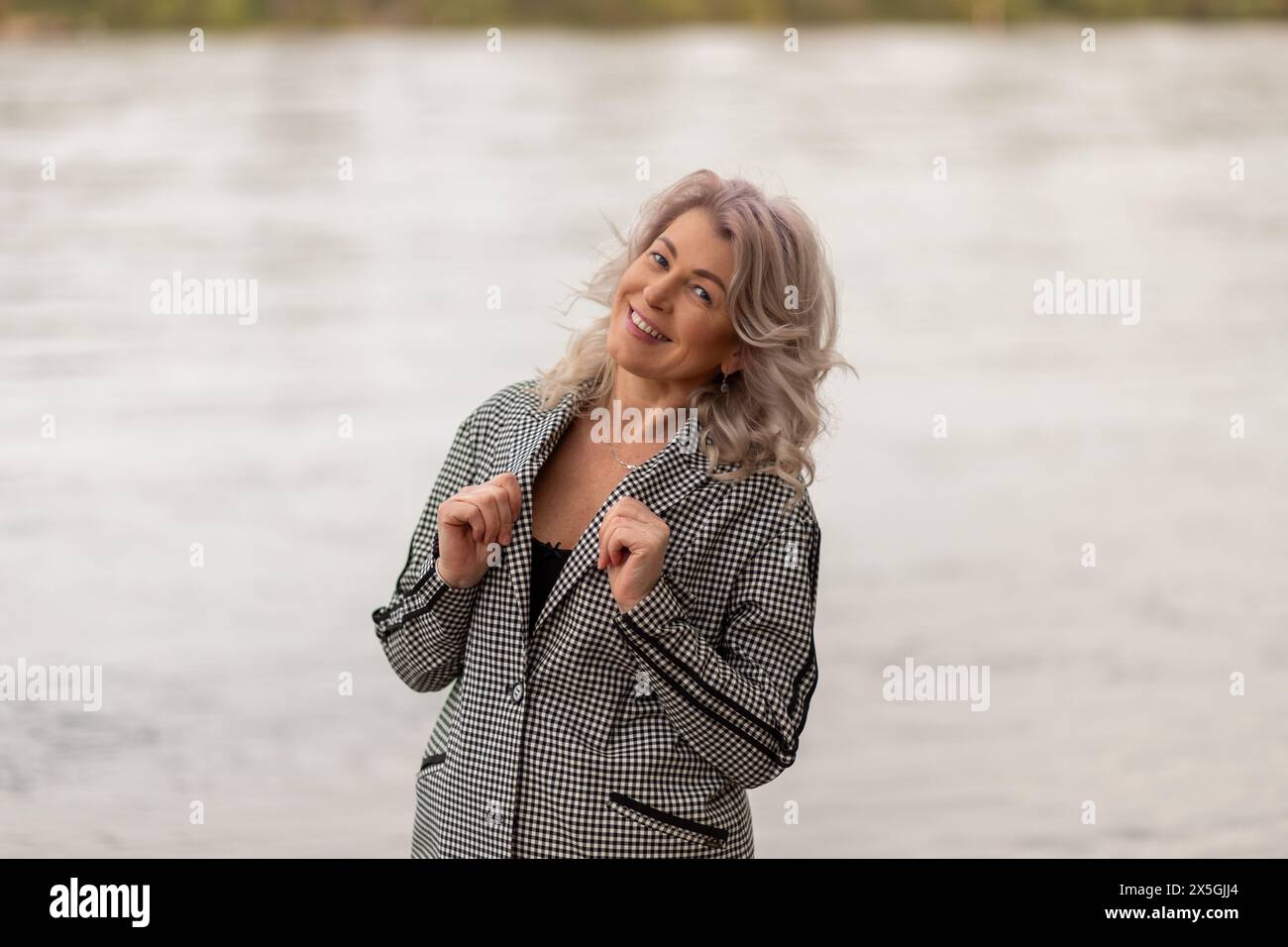 Happy mature woman smiling hi-res stock photography and images - Alamy
