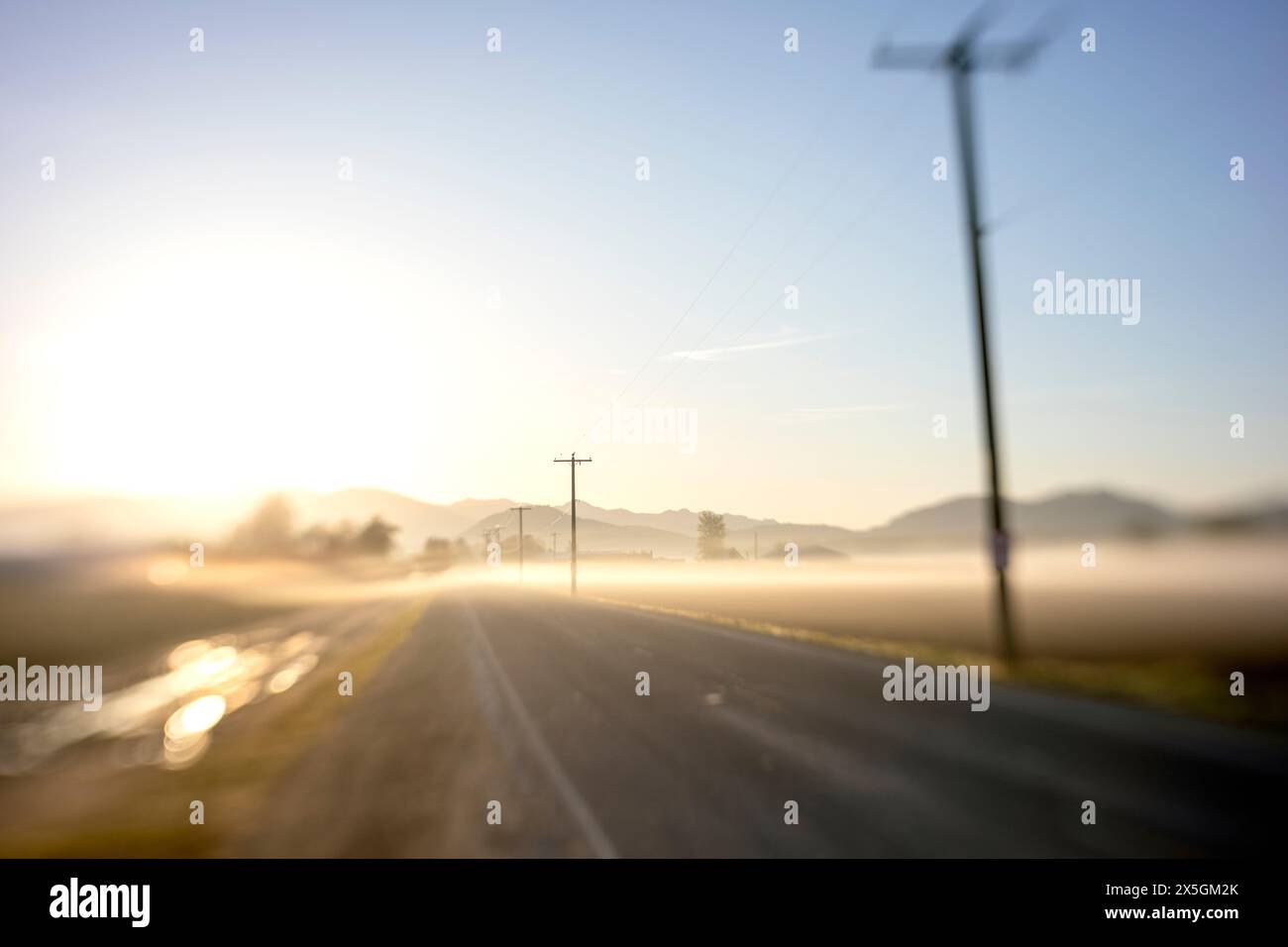 WA24776-00....WASHINGTON - Soft focus of a Skagit Valley farm road. LensBaby Sol45 lens. Stock Photo