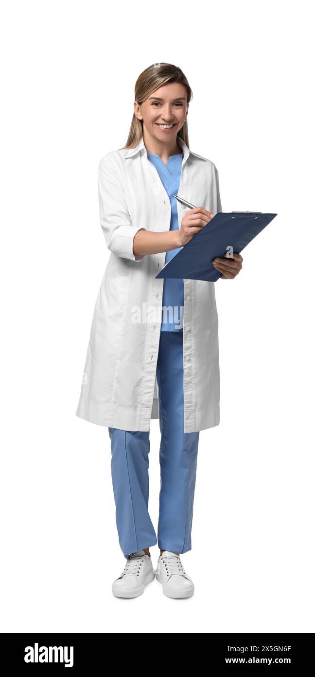 Portrait of happy doctor with clipboard on white background Stock Photo ...