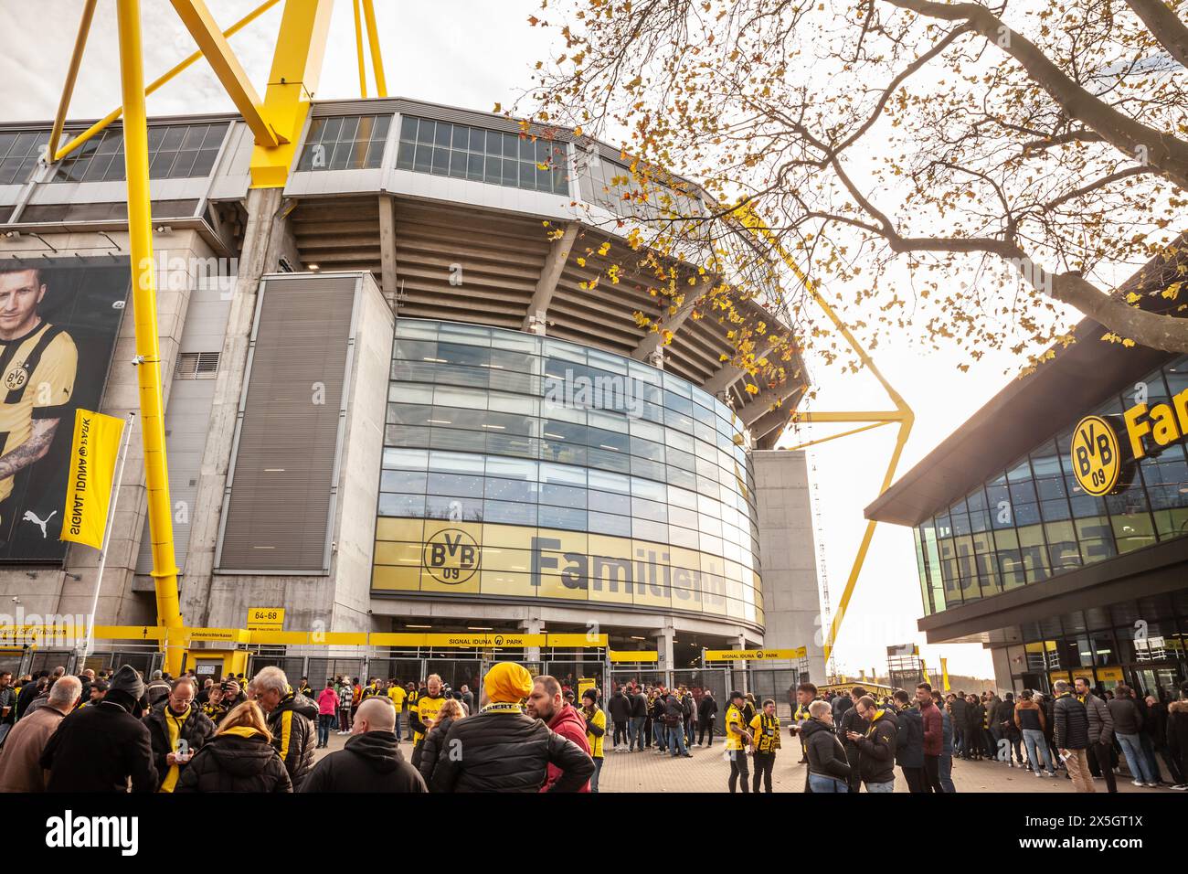Picture of a crowd of supporters getting ready to enter the Signal Iduna Park stadium in Dortmund. Westfalenstadion is a football stadium in Dortmund, Stock Photo