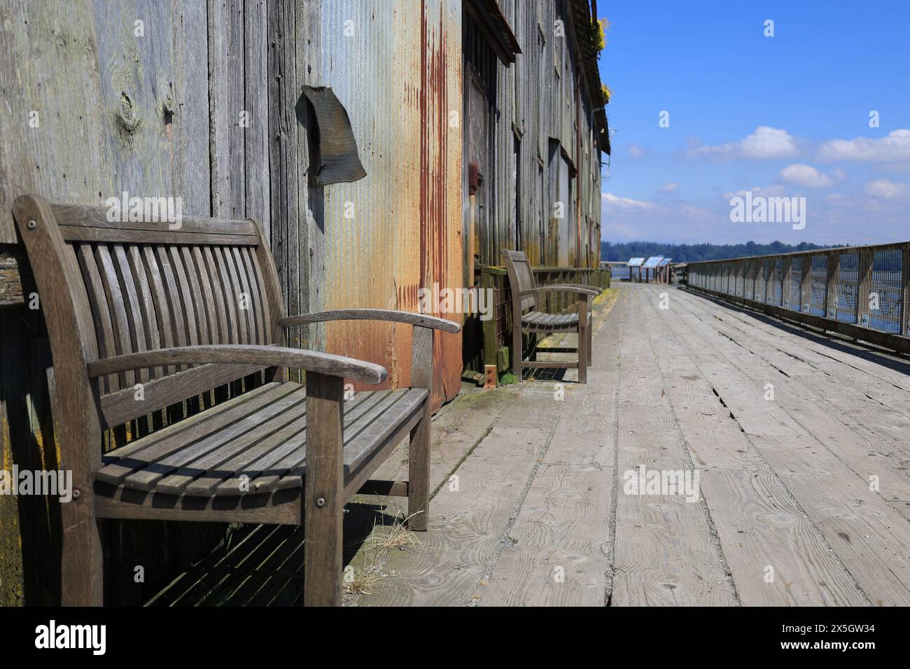 Old fishery building sidewalk Stock Photo