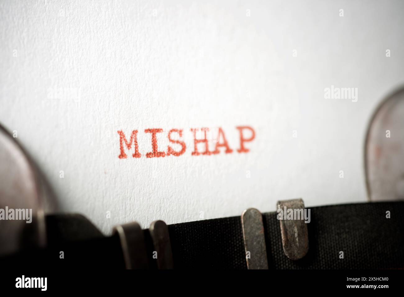 Mishap word written with a typewriter Stock Photo - Alamy