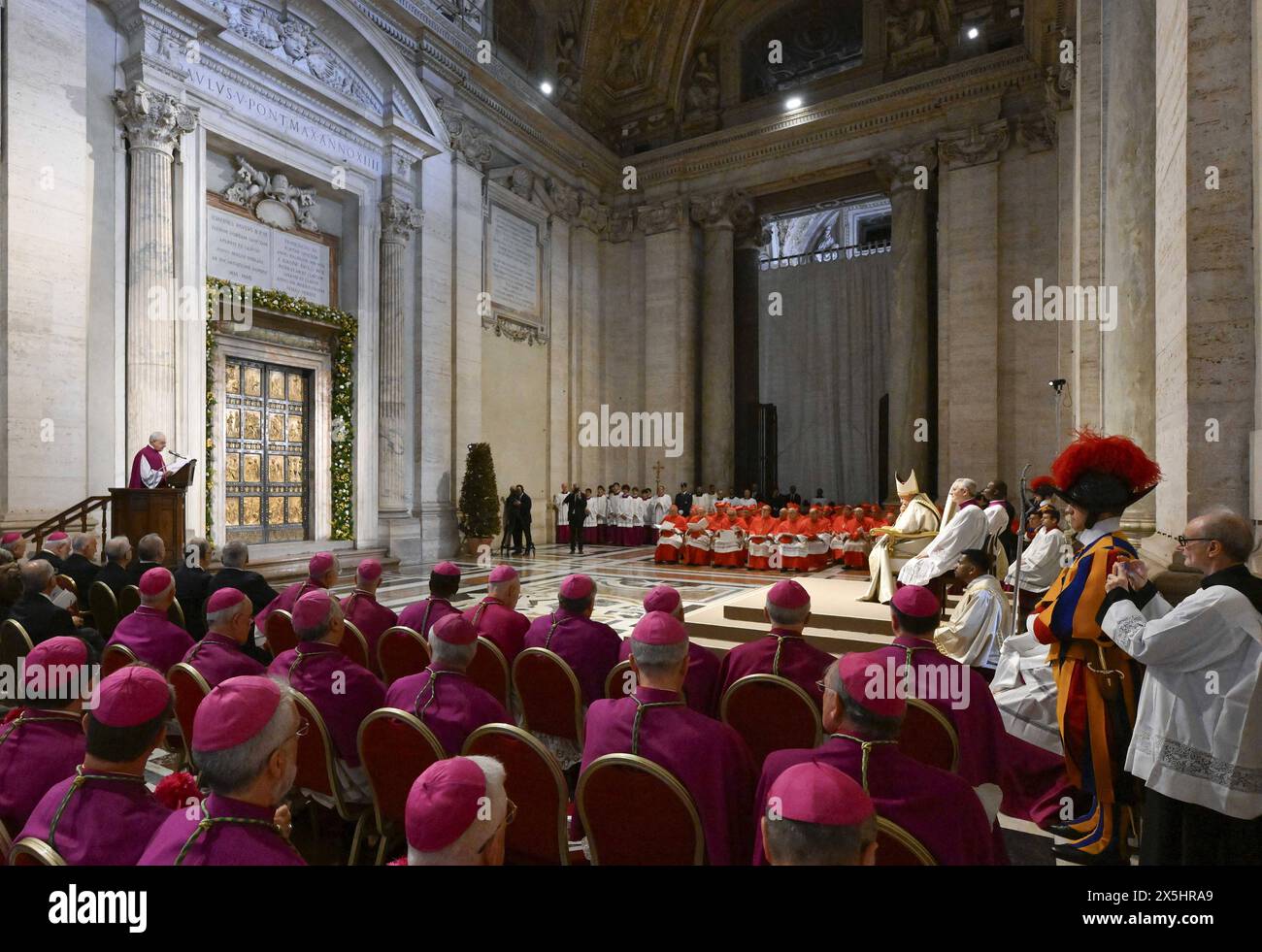Pope Francis, in front of the Holy Door, solemnly proclaims the