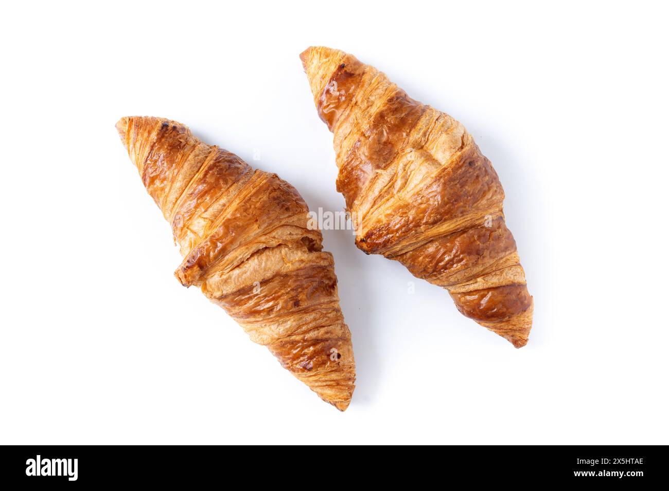 Fresh baked croissant isolated on white background Stock Photo - Alamy
