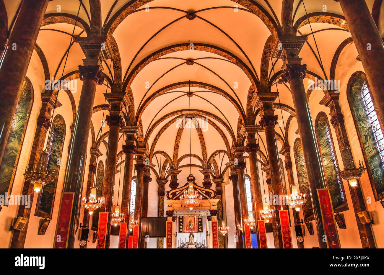 St. Joseph's Cathedral, Beijing, China. Famous catholic church built in 1655 and in Chinese character signs are Christian sayings in Chinese Stock Photo