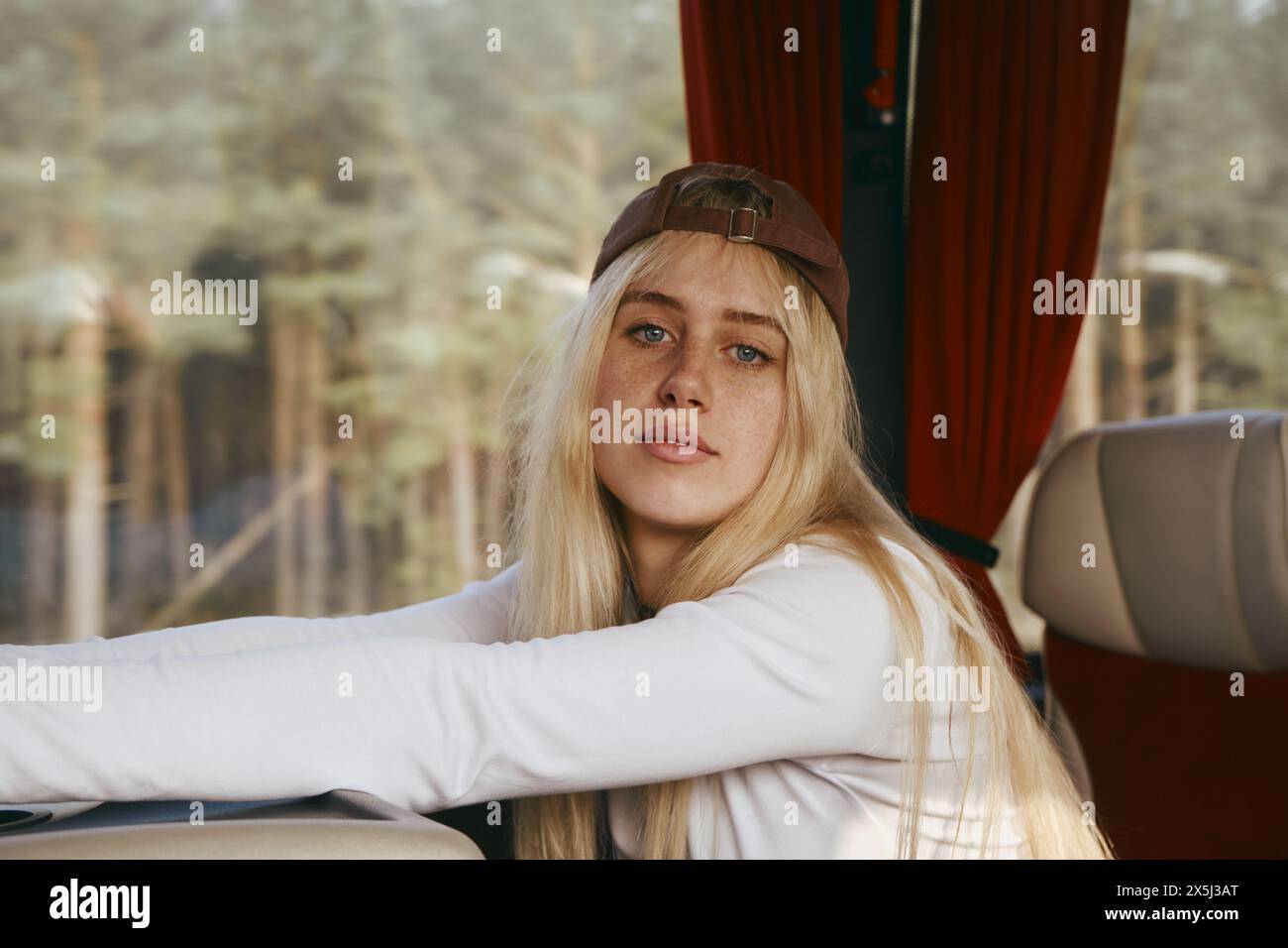 Young woman travelling by bus. Stock Photo