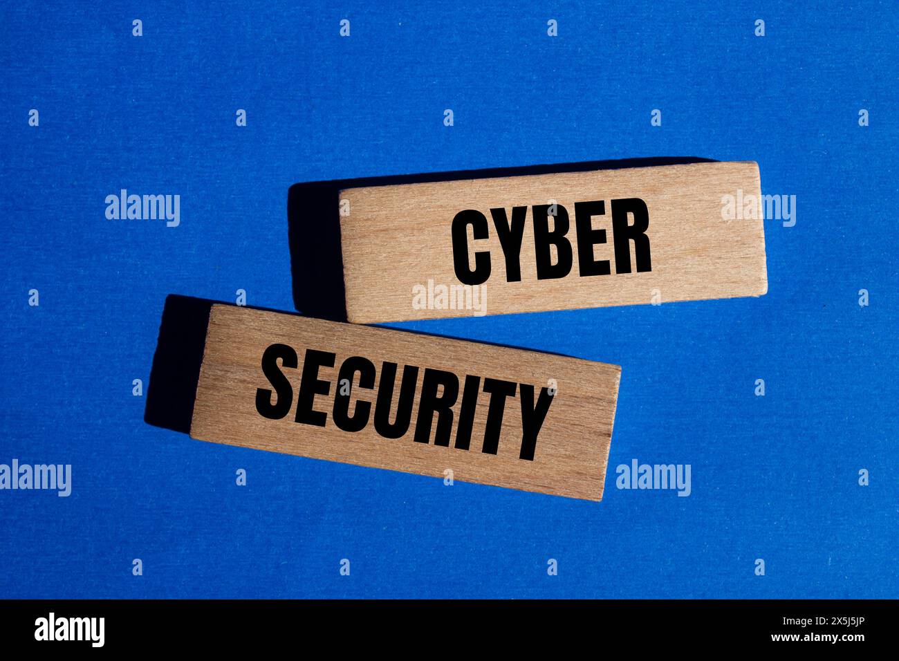 cyber-security-words-written-on-wooden-blocks-with-blue-background