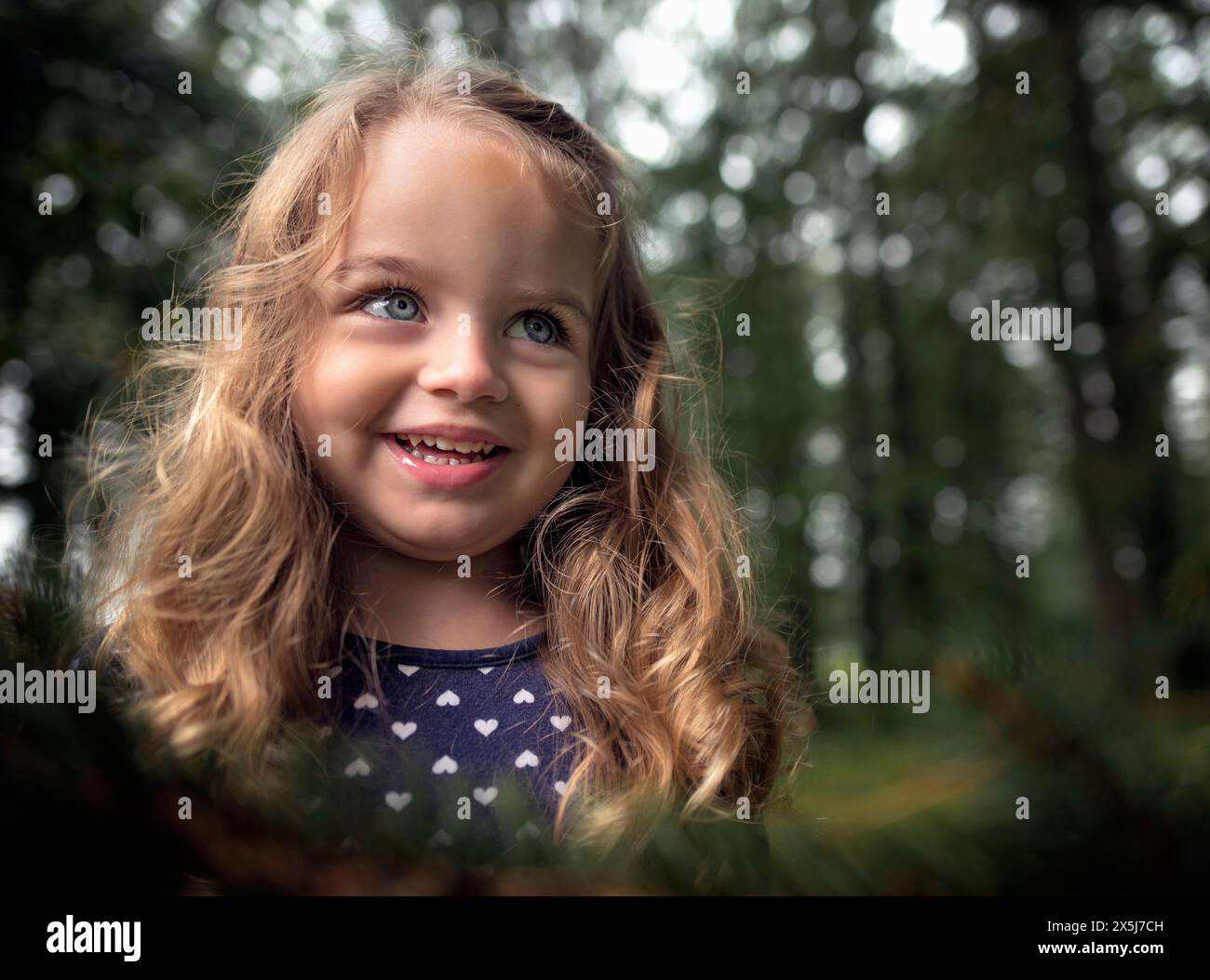 Beautiful happy little girl blue eyes blond curls smiling Stock Photo ...