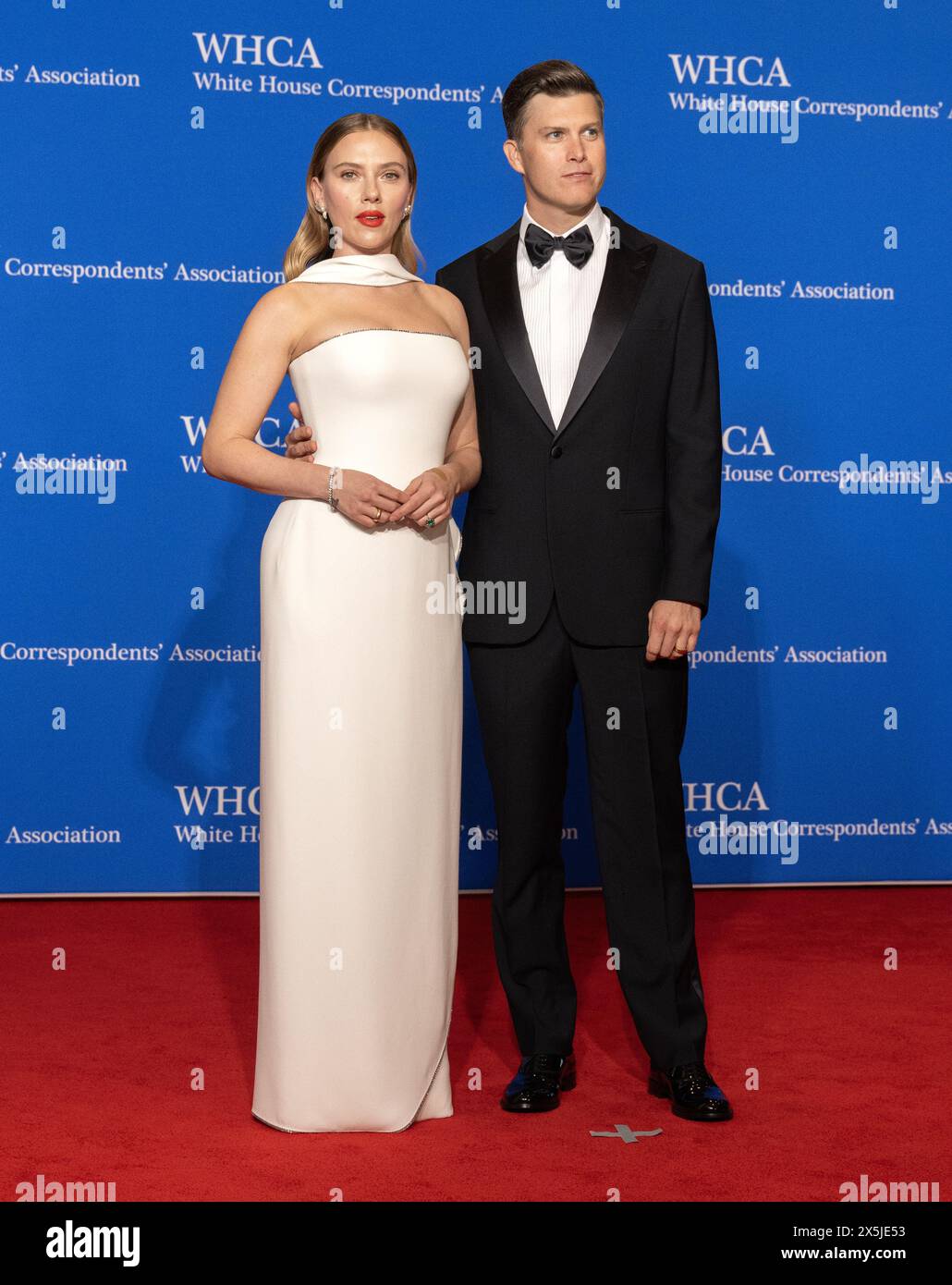 Actress Scarlett Johansson, left, and comedian Colin Jost arrive for