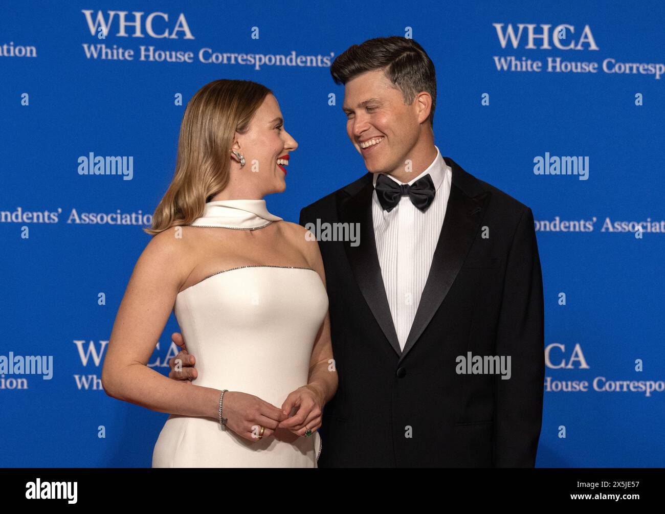 Actress Scarlett Johansson, left, and comedian Colin Jost arrive for