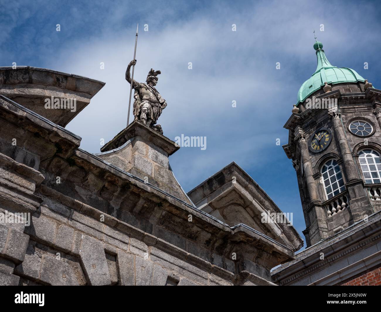 A scuplture sitting above the Fortitude Gate with the Bedford Tower also visible, Dublin Castle, in Dublin city centre, Ireland. Stock Photo