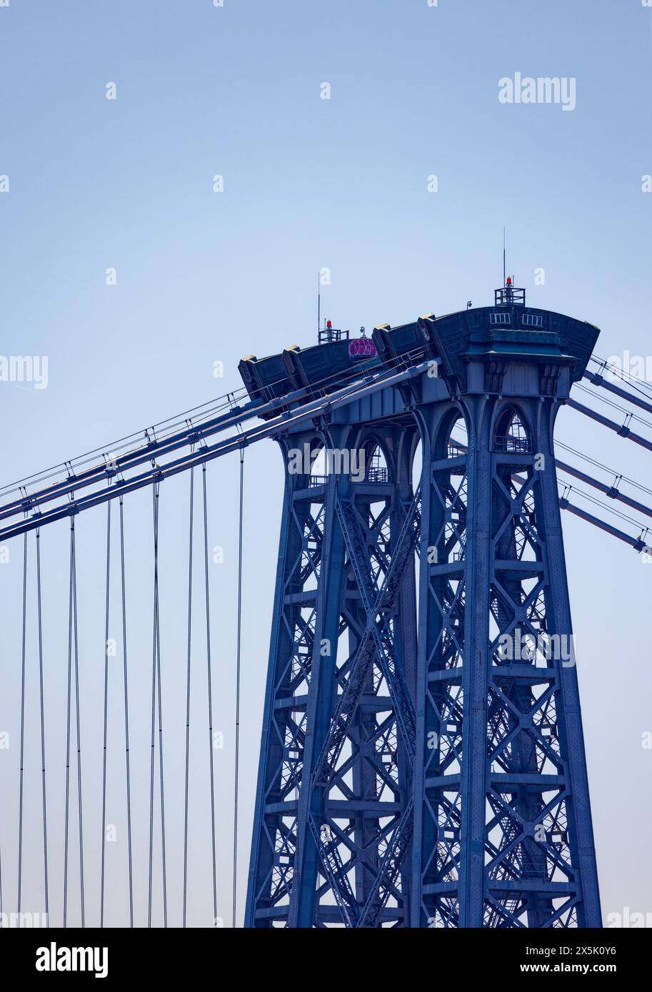 Tower detail of the Williamsburg Bridge. Only the bridge’s center span is suspended from the main cables. Stock Photo