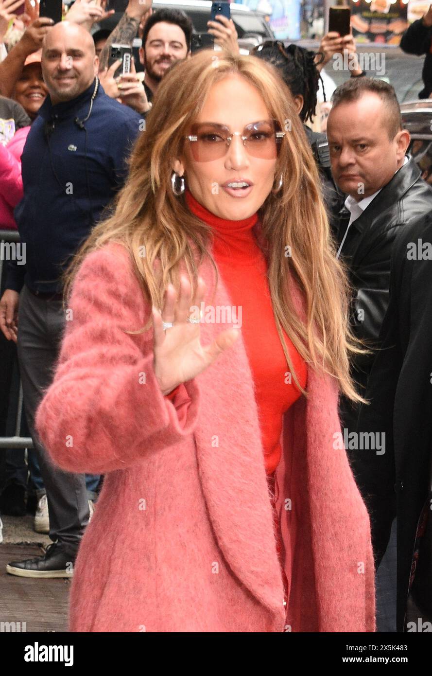 Jennifer Lopez seen at Good Morning America donning a pink coat over a red ensemble. Featuring Jennifer Lopez Where New York City New York United States When 06 May 2024 Credit Media