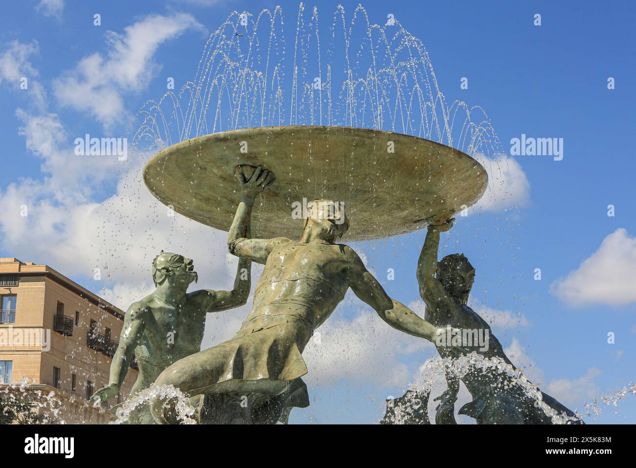 Valletta, Malta. Triton Fountain, water fountain in Malta. Stock Photo