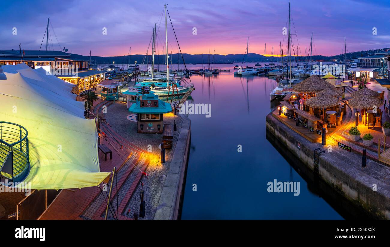 View of boats and restaurants at Knysna Waterfront at dusk, Knysna, Western Cape Province, South Africa, Africa Copyright: FrankxFell 844-33436 Stock Photo