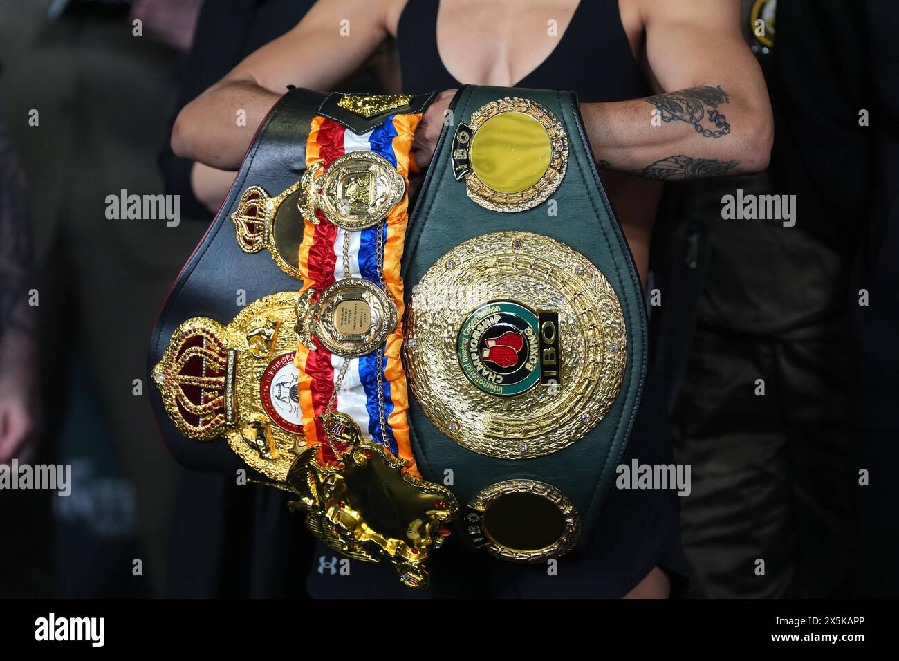 Jessica McCaskill with the belts during the weigh in at the Cardiff City Stadium. Picture date: Friday May 10, 2024. Stock Photo