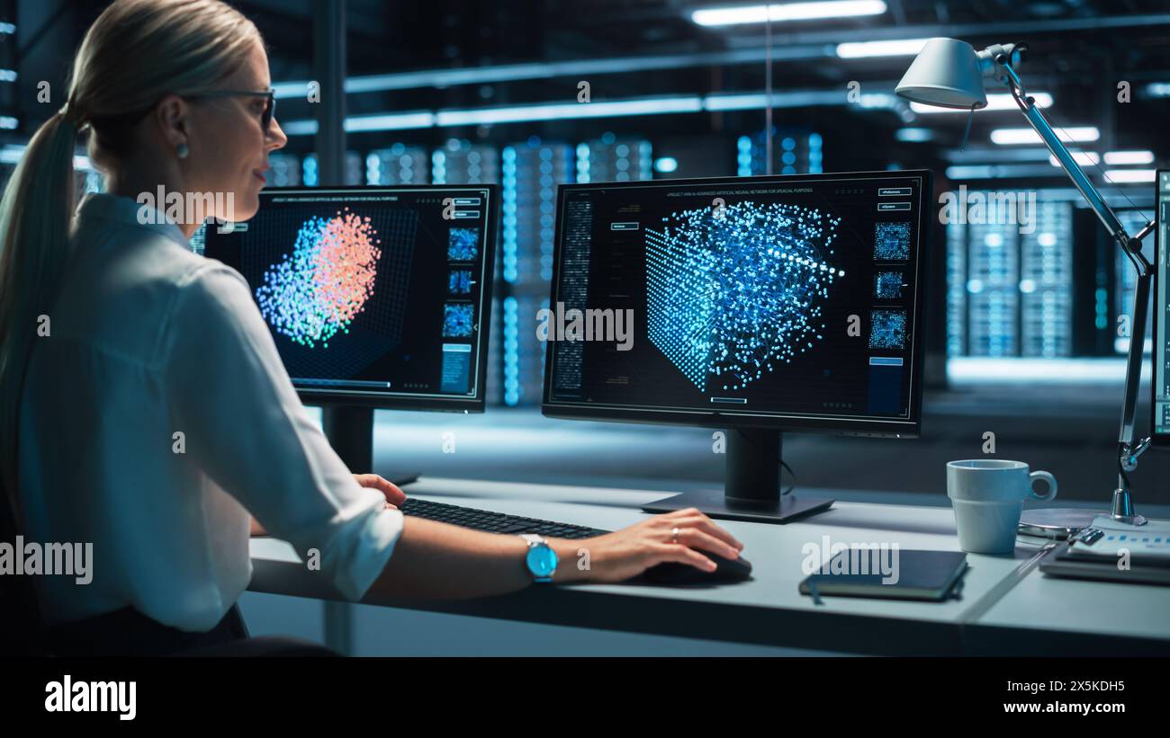 European Female Specialist Works on a Computer with Neural Network ...