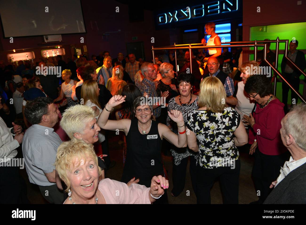 Old mods and Northern Soul music fans from the 1960s friends reunion dance party disco Britain, Uk. Stock Photo
