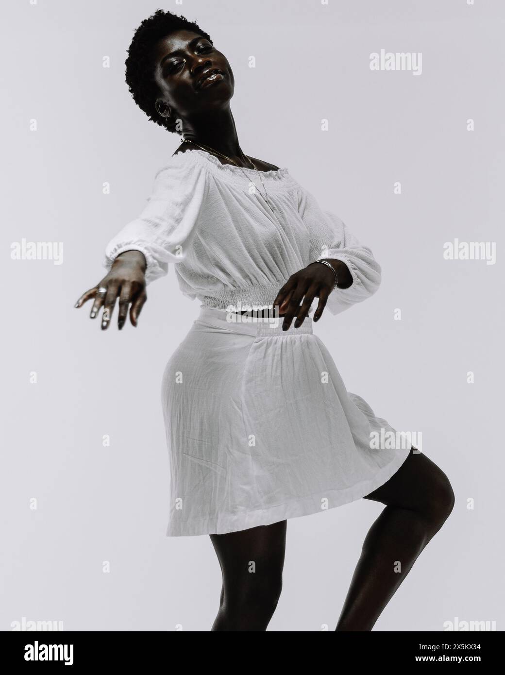 Woman in mini skirt hi-res stock photography and images - Alamy