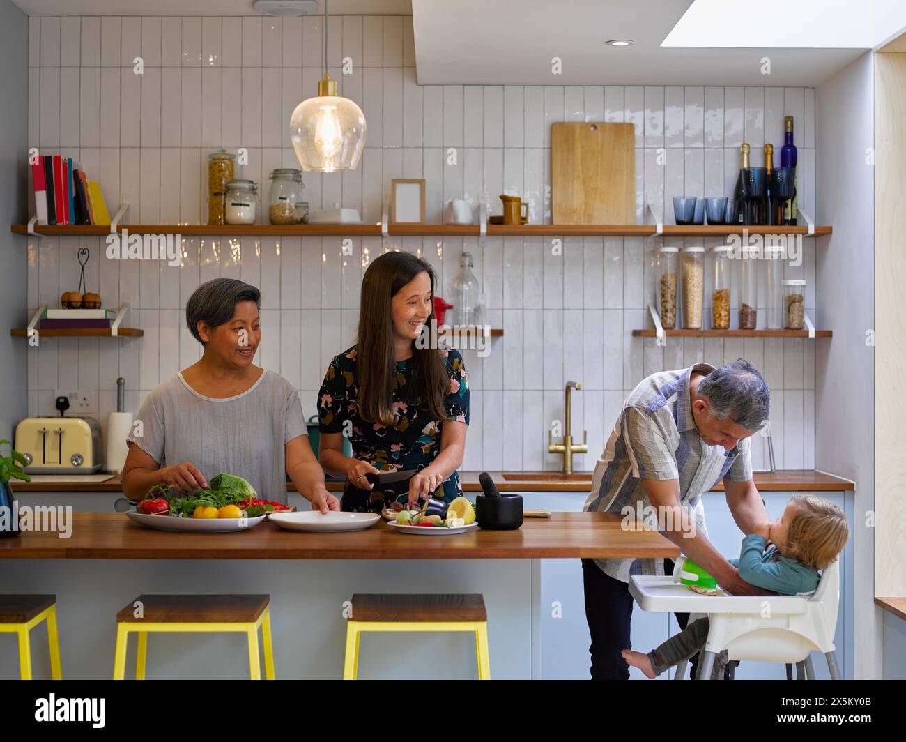 Mother and child kitchen stool hi-res stock photography and images - Alamy