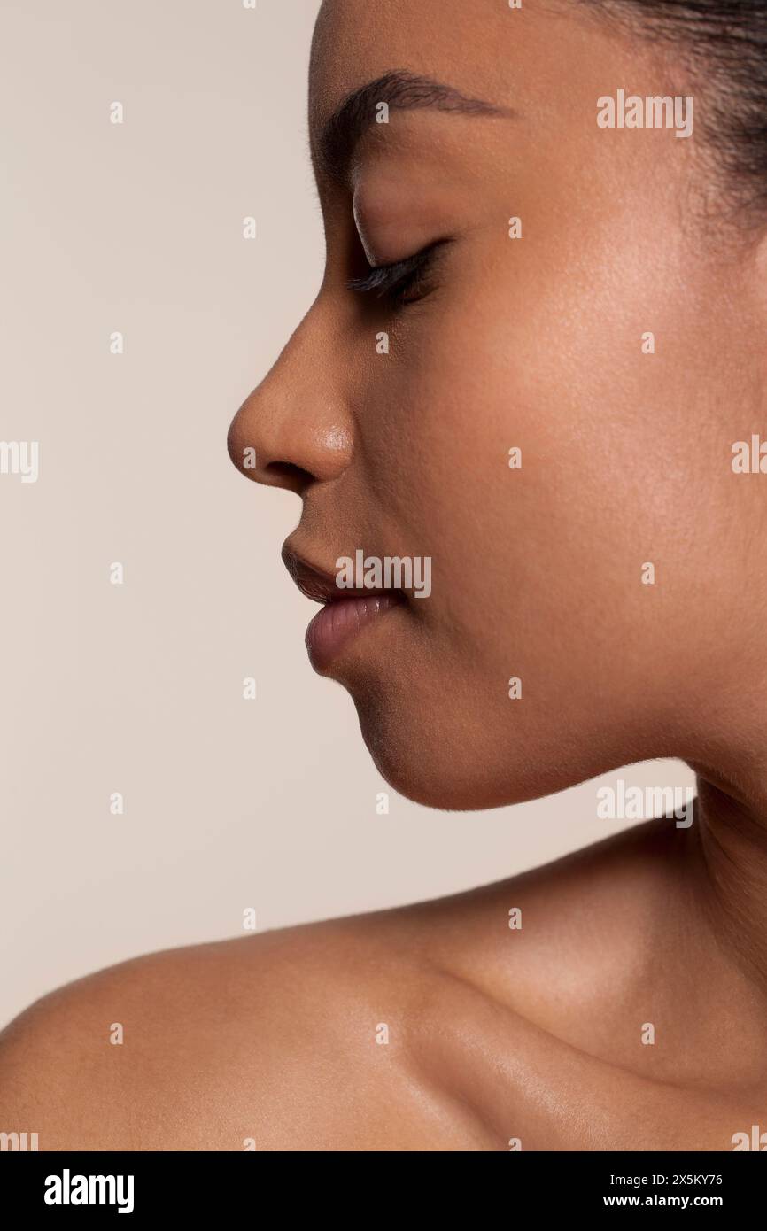 Shot side young woman face hi-res stock photography and images - Alamy