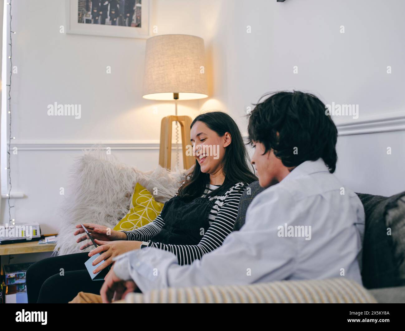 Brother sister on sofa hi-res stock photography and images - Alamy