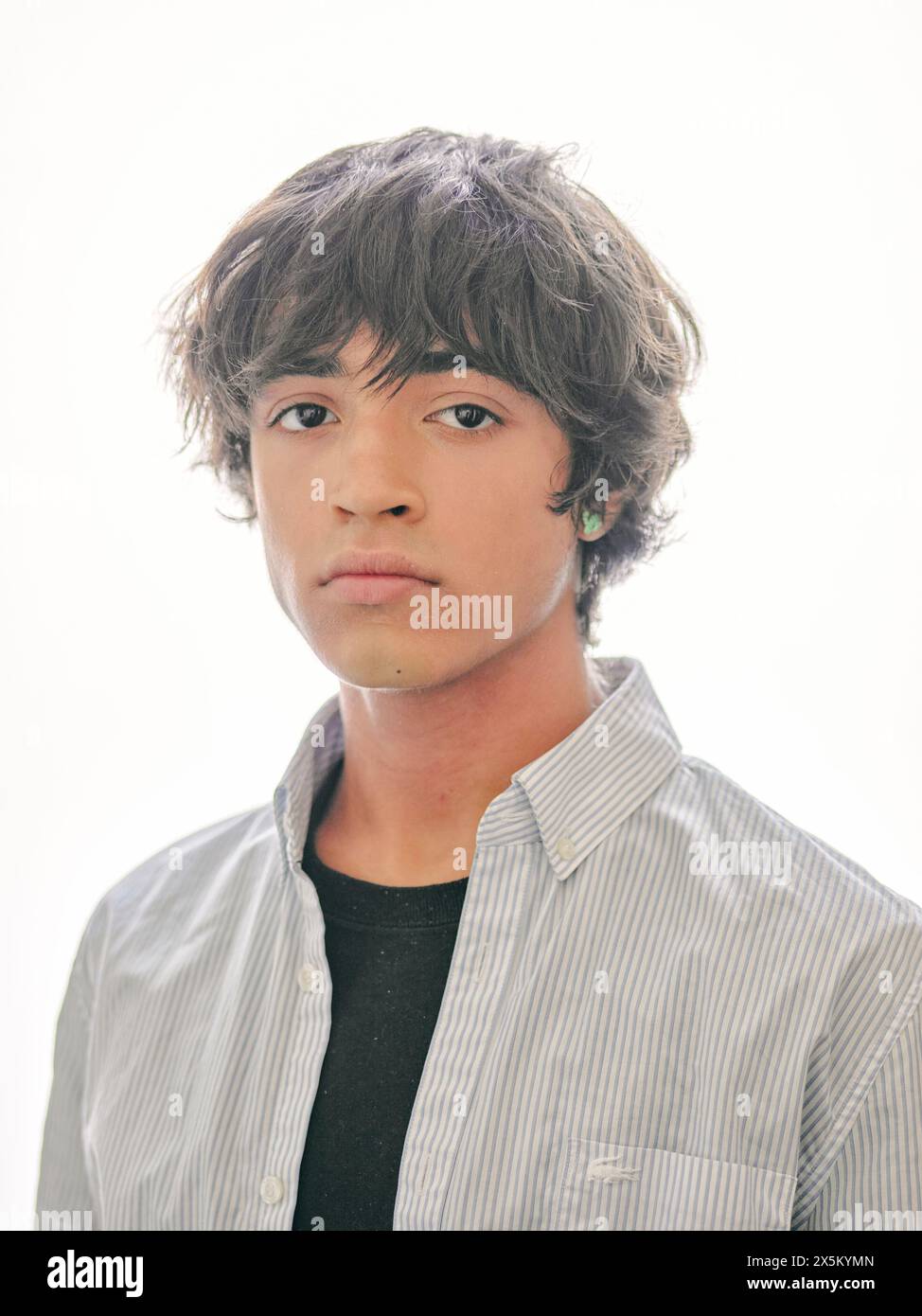 Studio portrait of teenage boy Stock Photo - Alamy