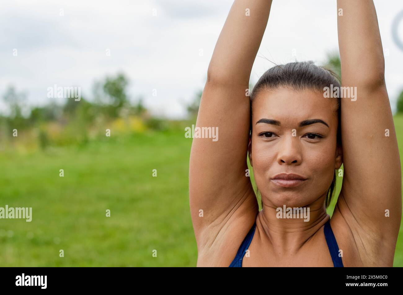 Stretching thinking black woman hi-res stock photography and images - Alamy