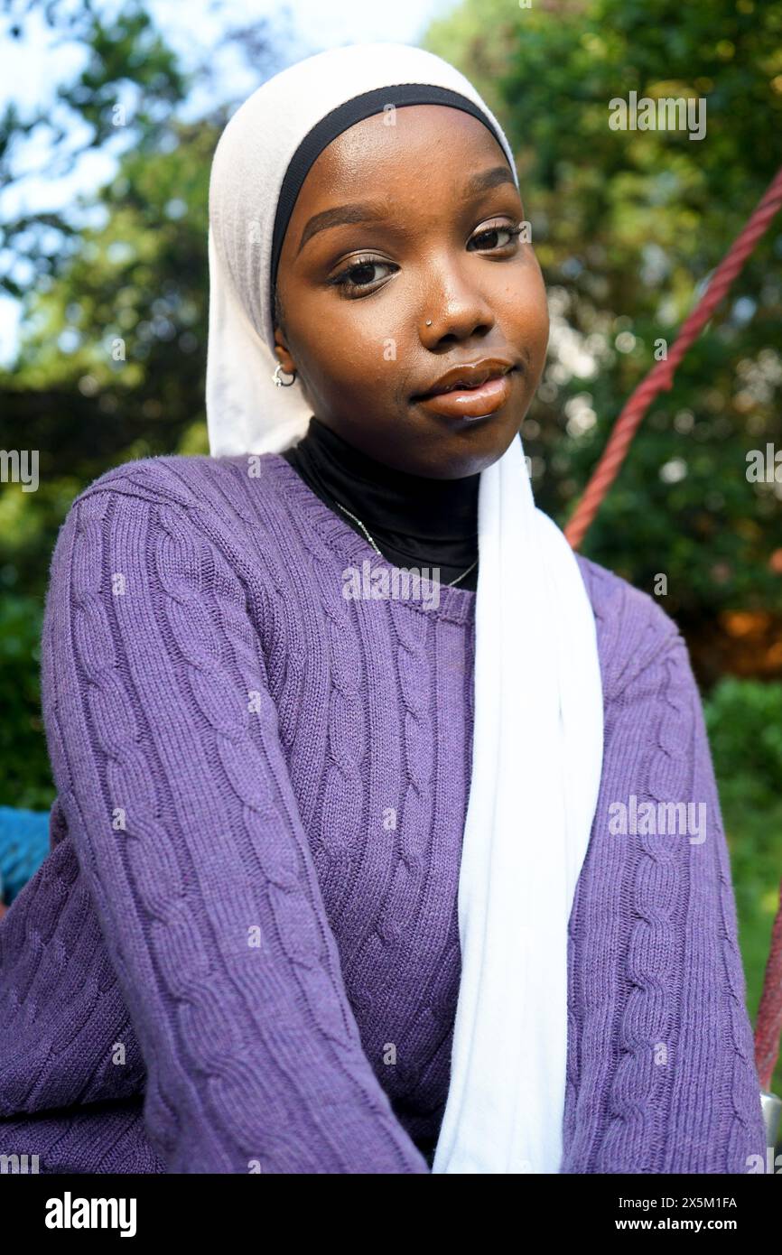 UK, London, Portrait of young woman wearing hijab outdoors Stock Photo