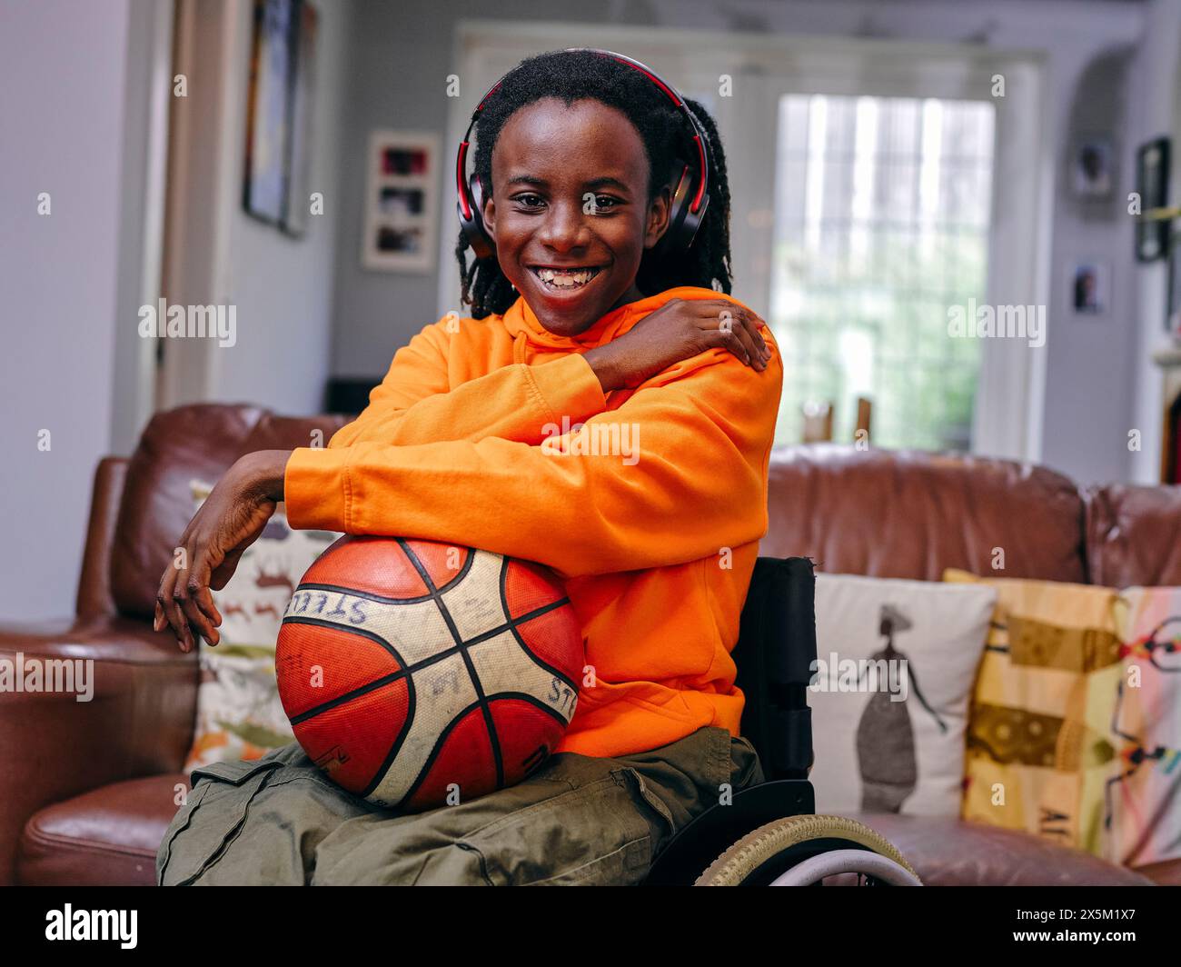 girl-in-wheelchair-holding-basketball-stock-photo-alamy
