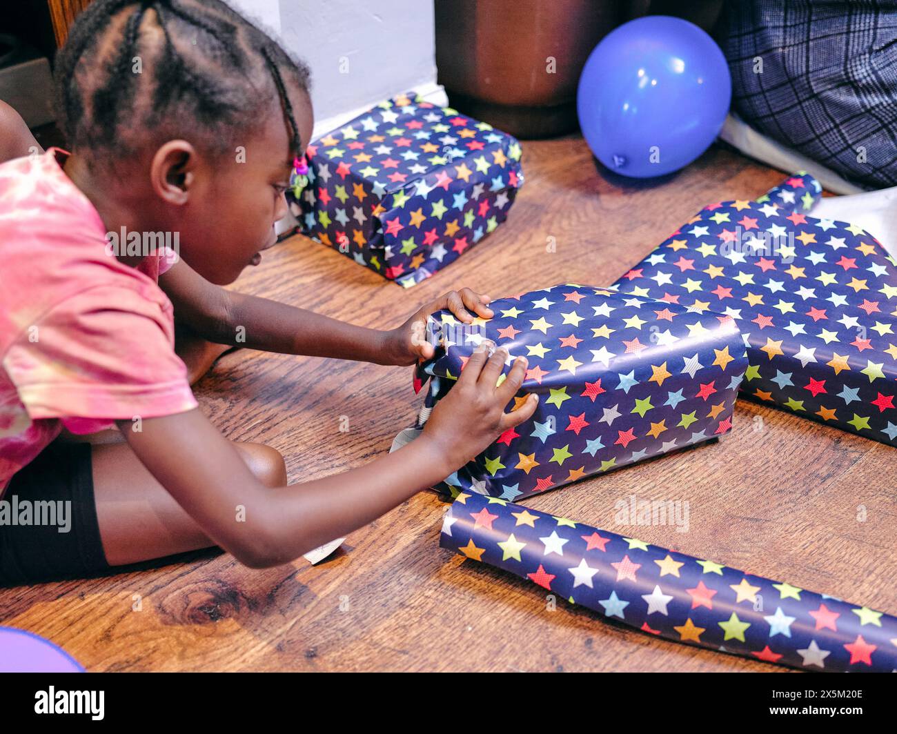 girl-wrapping-birthday-presents-stock-photo-alamy