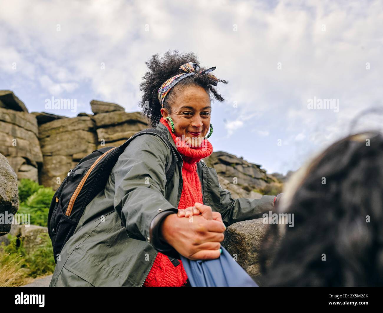 Helping hands mountain hi-res stock photography and images - Alamy
