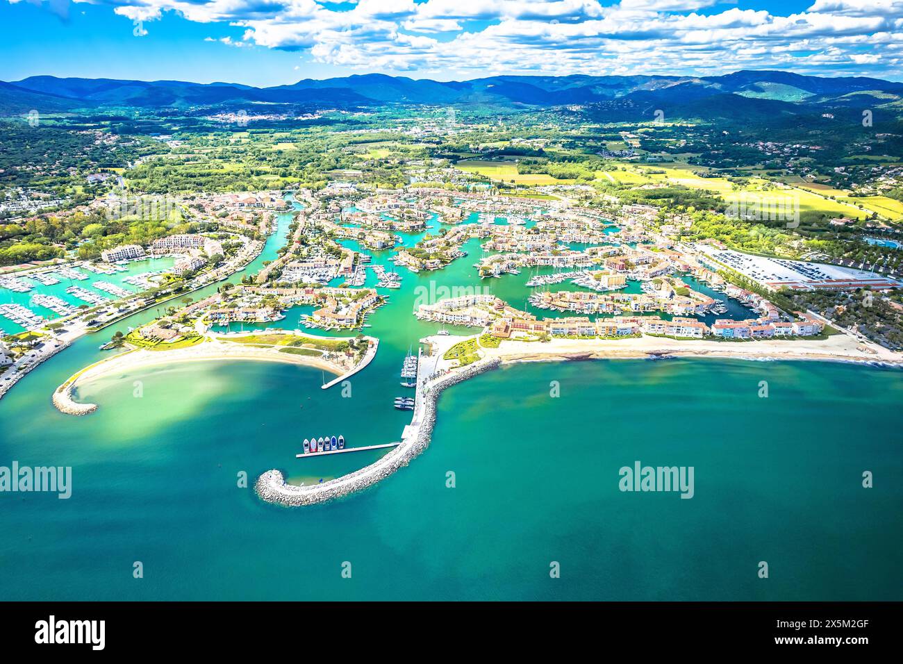 Scenic Port Grimaud yachting village marina aerial view, archipelago of