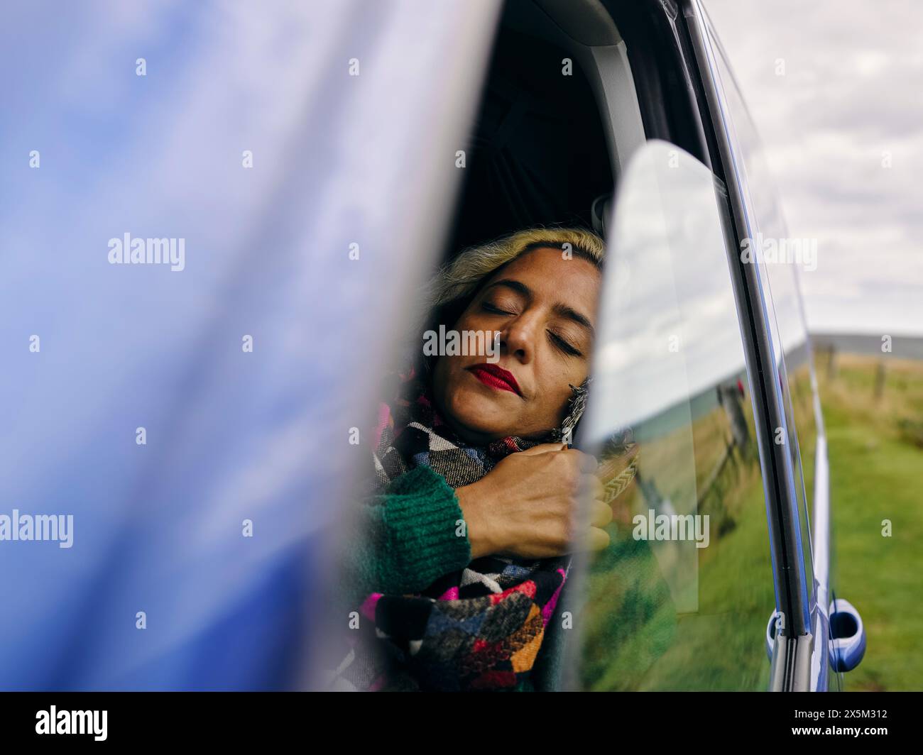 Woman sleeping in car Stock Photo Alamy