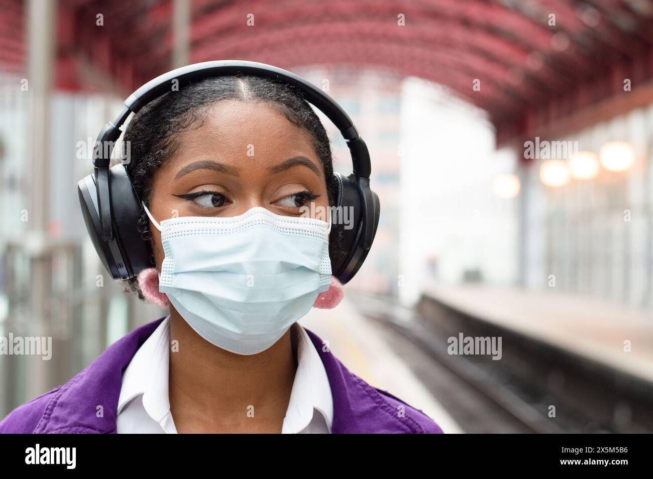 African woman wearing face mask hi-res stock photography and images - Alamy