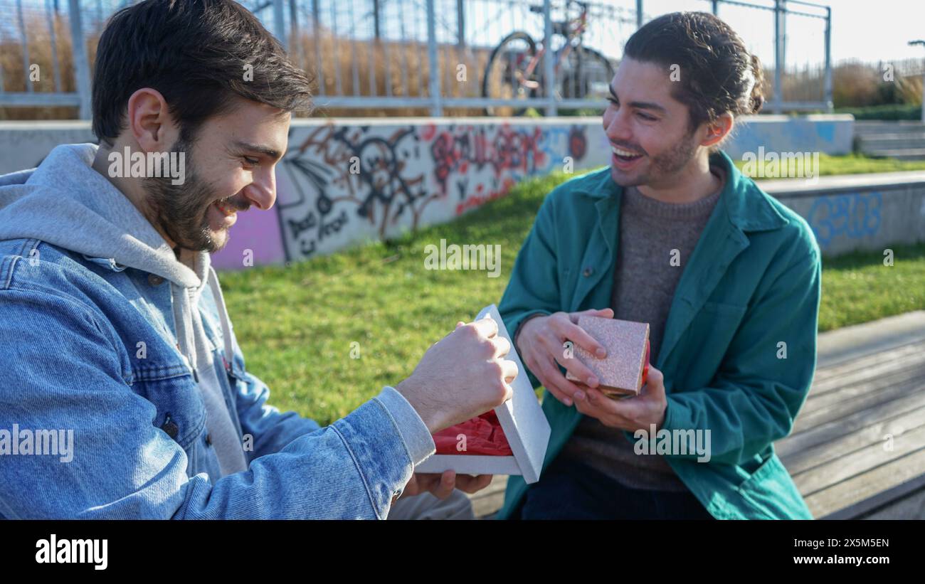 Cheerful gay man receive hi-res stock photography and images - Alamy